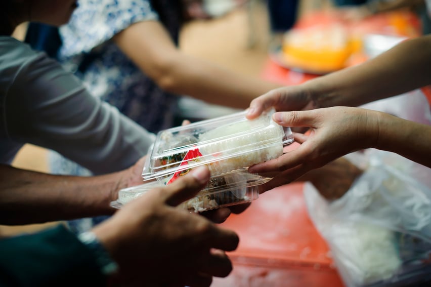 Participation in sharing food for the poor : The Concept of Love : The beggar is waiting for food from charity aid : Charity food shared to everyone in society and the poor need this charity food